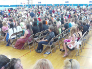 Timothy seated for North Middle School Graduation